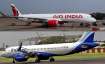 रनवे पर खड़े एयर इंडिया और इंडिगो के विमान।- India TV Paisa