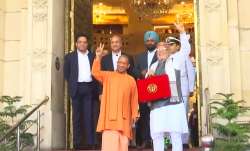 विधानसभा में बुधवार को बजट पेश करने जाने से पहले मुख्यमंत्री योगी आदित्यनाथ और वित्त मंत्री सुरेश कु- India TV Paisa