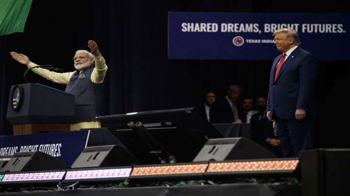 President Donald Trump stands on stage with Indian Prime Minister Narendra Modi President Donald Trump stands on stage with Indian Prime Minister Narendra Modi