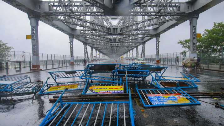 The collapsed police barricades at Howrah Bridge after strong winds due to Cyclone Amphan, at Howrah