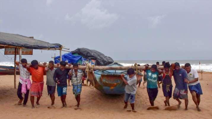 Fishing boats anchored at the Puri beach after authorities warned fishermen not to venture into the 