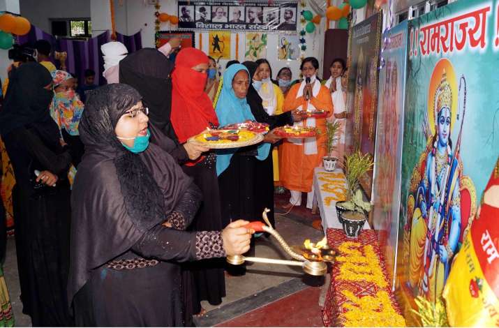 Members of the Muslim community perform 'aarti' of Lord Ram as they celebrate the ground breaking ce