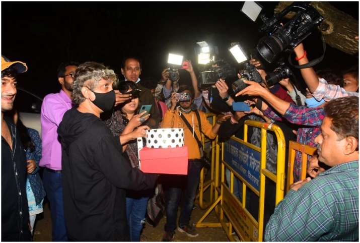Varun Dhawan ties the knot with Natasha laddo distribution for media 