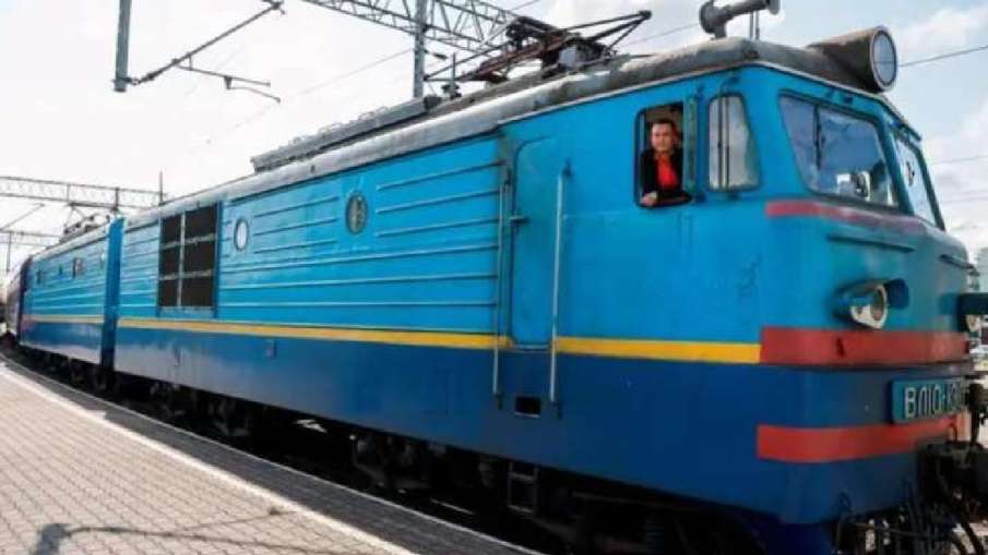 Train driver Vasyl poses in his train at Przemysl train station