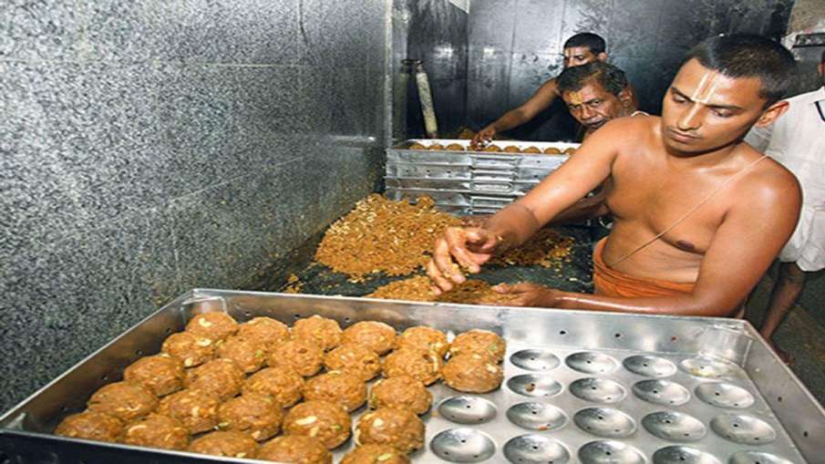 A team of 600 Brahmins prepare laddus in the kitchen