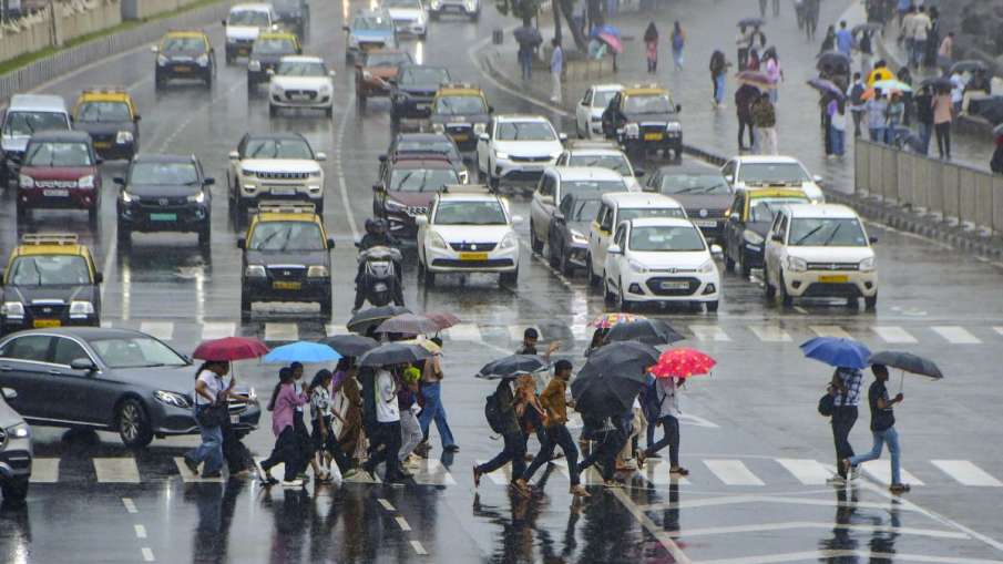 People going amid rain in Mumbai