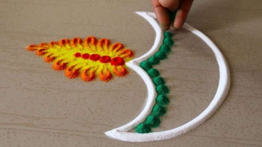 दीये के डिजाइन वाली रंगोली