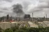 Smoke is seen after a fire broke out at a refinery of...- India TV Hindi