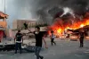 Iraq: 12 dead in Basra as rockets fired at airport and Iranian consulate torched | AP- India TV Hindi