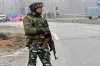 Security personnel stands guard at the site of suicide bomb...- India TV Hindi