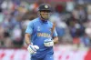 India's MS Dhoni reacts as he leaves the field after being...- India TV Hindi