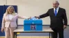 Israeli Prime Minister Benjamin and his wife Sarah casts their votes at a voting station in Jerusale- India TV Hindi