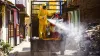 Workers spray disinfectant in a residential area to contain the spread of coronavirus- India TV Hindi