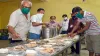 Jabalpur: Volunteers pack meals to distribute among...- India TV Hindi