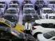 ऑटोमोबाइल डीलर्स कर्मचारी वाहनों केे बीच मेें खड़ा हुुुुुआ। (च‍ि‍त्र प्रतीकात्‍मक)- India TV Hindi News