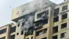 Smoke billows out after a blaze on the 18th floor of Kamla...- India TV Hindi