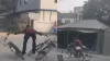 man riding two bicycles at the same time- India TV Hindi