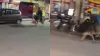 सड़क पर सांड को दौड़ाता हुआ युवक।- India TV Hindi