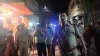 बदमाशों से परेड़ करवाती हुई पुलिस।- India TV Hindi