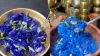 महिला ने फूल के रंग से बनाया नीले रंग का चावल- India TV Hindi
