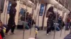दिल्ली मेट्रो में डांस करके रील बनवाती हुई महिला- India TV Hindi