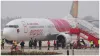  Air India Express flight caught fire in engine 179 passengers evacuated safely after landing on ben- India TV Hindi