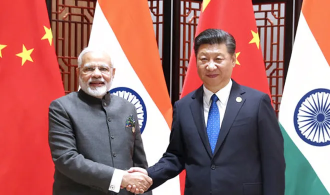 डोकलाम गतिरोध को पीछे छोड़ आगे बढ़ने पर सहमत हुए भारत और चीन Narendra Modi and Xi Jinping- India TV Hindi
