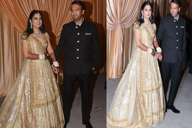 Isha Ambani and Anand piramal Reception: गोल्डन ड्रेस में राजकुमारी की तरह नजर आईं ईशा अंबानी, देखें तस्वीरें Isha Ambani- India TV Hindi