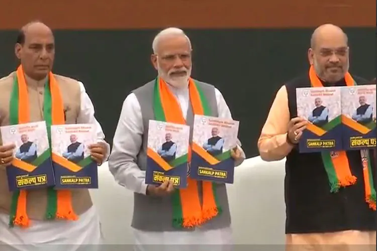BJP Manifesto Live Updates: भारतीय जनता पार्टी ने लोकसभा चुनावों के लिए अपना मैनिफेस्टो 'संकल्प पत्र' जारी कर दिया है BJP Launches Election Manifesto for 2019 Lok Sabha Elections- India TV Hindi