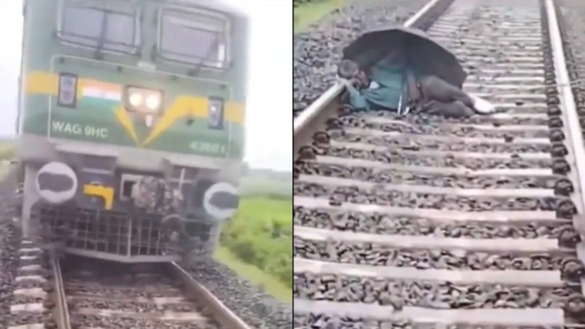 Video: छतरी लगाए रेलवे ट्रैक पर ही सो गया शख्स, लोको पायलट की नजर पड़ी तो ट्रेन रोककर उसे जगाया रेलवे पटरी पर सोता हुआ बुजुर्ग शख्स- India TV Hindi