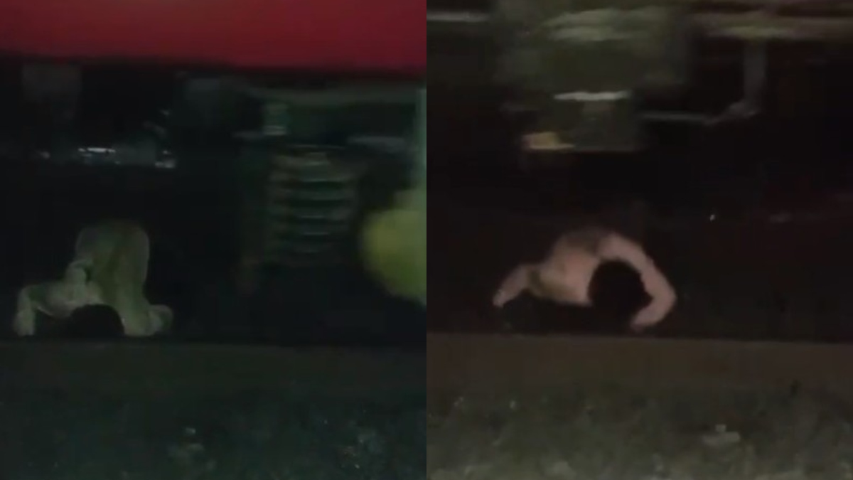 शख्स के ऊपर से गुजर गई पूरी ट्रेन, पर बच गई जान; खौफनाक है VIDEO