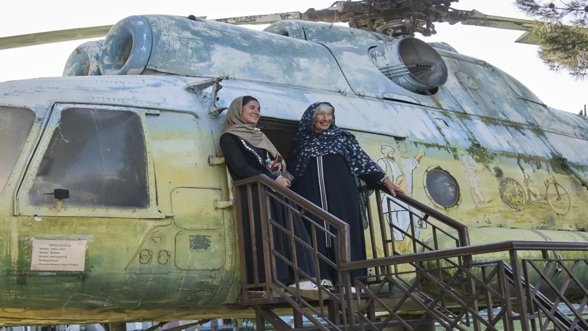 Afghanistan Female Tour Guide Somaya Moniry (L)- India TV Hindi