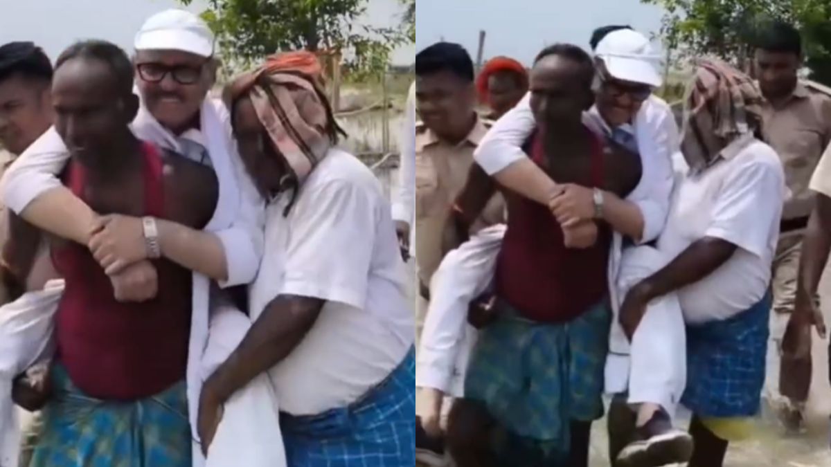 बाढ़ पीड़ित की ही पीठ पर चढ़ गए कांग्रेस सांसद तारिक अनवर, Video जमकर हो रहा वायरल
