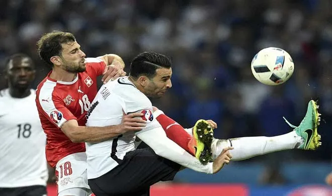  Switzerland's Admir Mehmedi fights for the ball with...- India TV Hindi