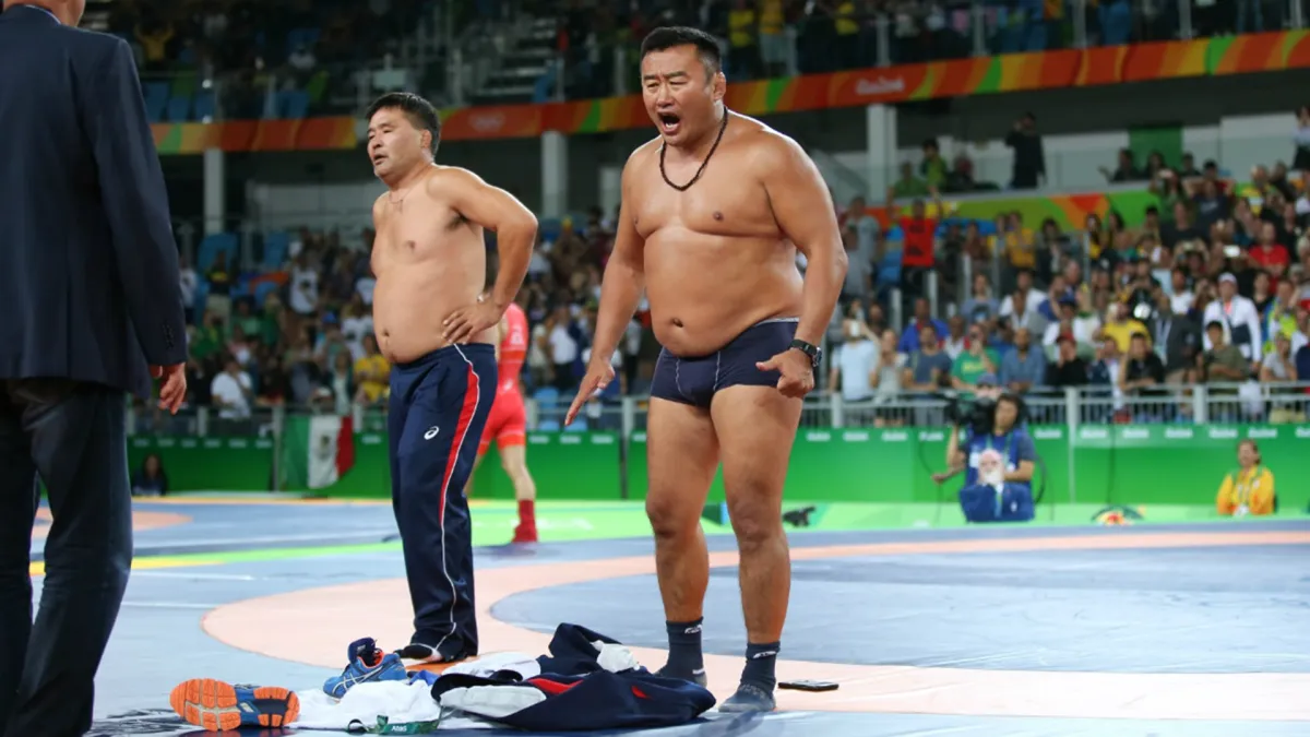 mongolian wrestling coaches strip down in protest after...- India TV Hindi