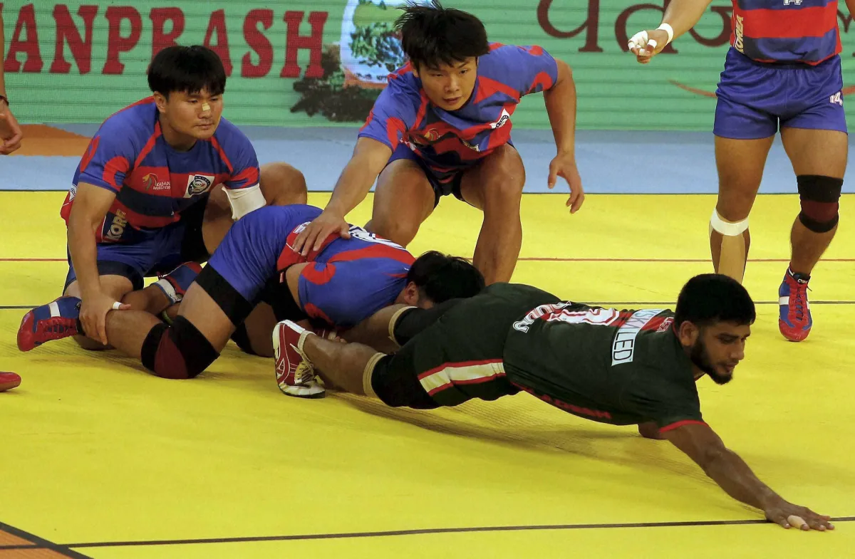 Player of Bangladesh (green) get point successfully against...- India TV Hindi