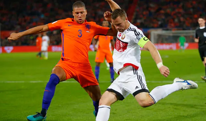 Sergei Kornilenko, right, passes the ball to Aleksey Rios |...- India TV Hindi