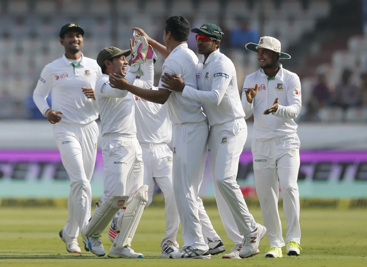 Mushfiqur Rahim celebrates with teammates the dismissal of...- India TV Hindi