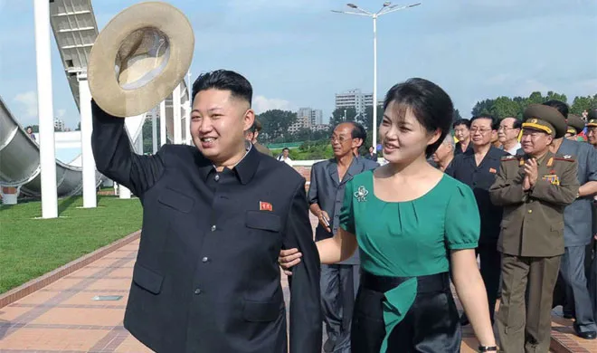 Kim Jong Un with Wife | AP Photo- India TV Hindi