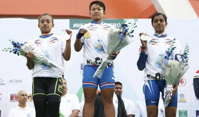 Manorama Devi (centre) after wining the National Cycling...- India TV Hindi