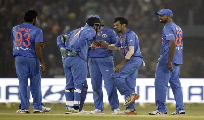 Yuzvendra Chahal celebrates with teammates the dismissal of...- India TV Hindi