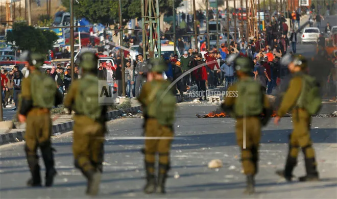 Palestinians clash with Israeli troops | AP Photo- India TV Hindi