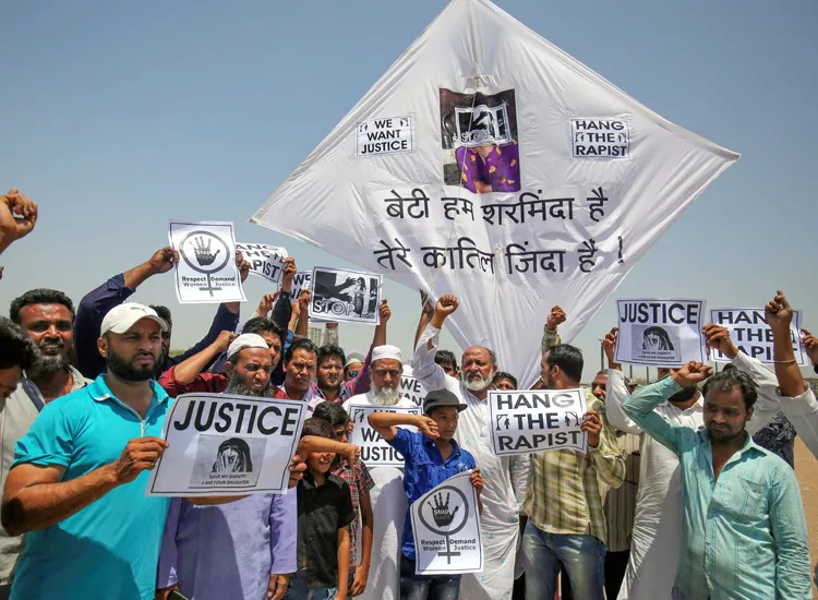 People display kites and placard during a protest against...- India TV Hindi