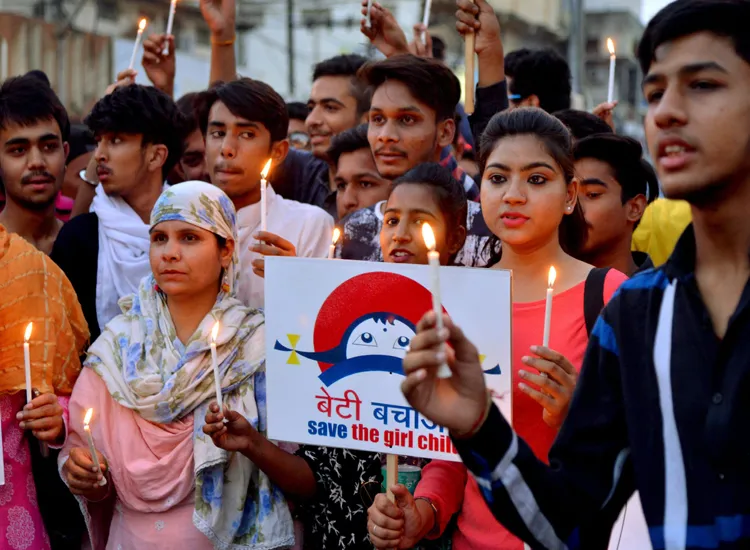 Students take part in a candle light march to protest...- India TV Hindi