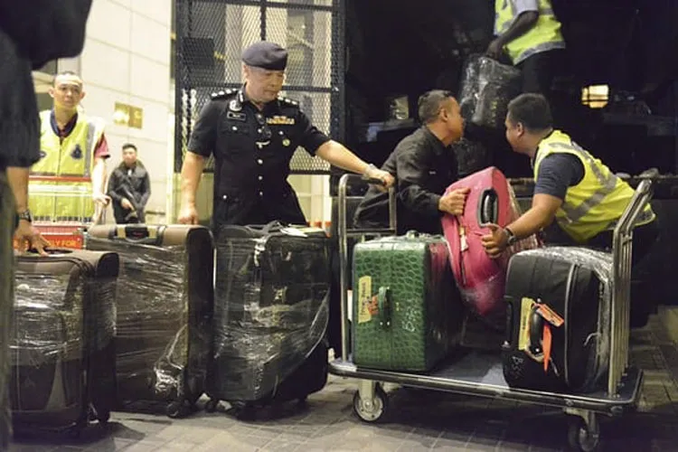 Malaysian police seize dozens of bags of cash, jewels in Najib Razak raids | AP Photo- India TV Hindi