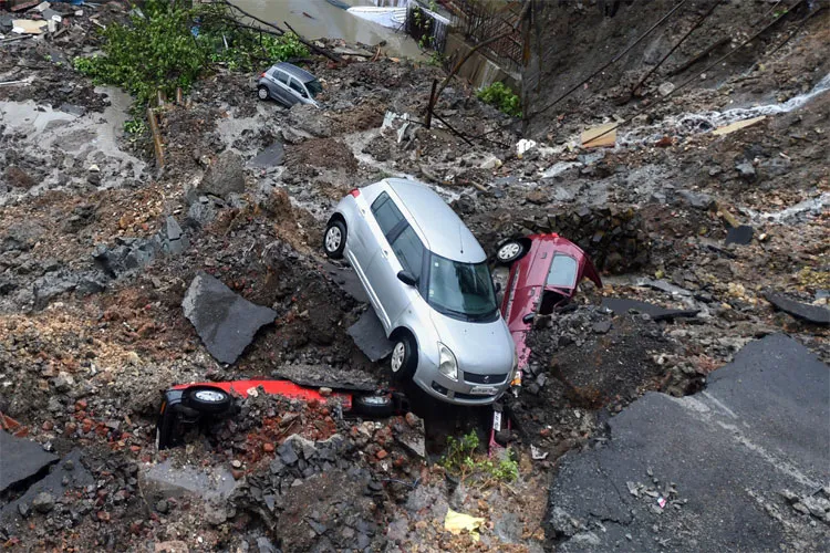 Mumbai Rains: Cars buried as wall collapses after heavy rain, trains services disrupted | PTI- India TV Hindi