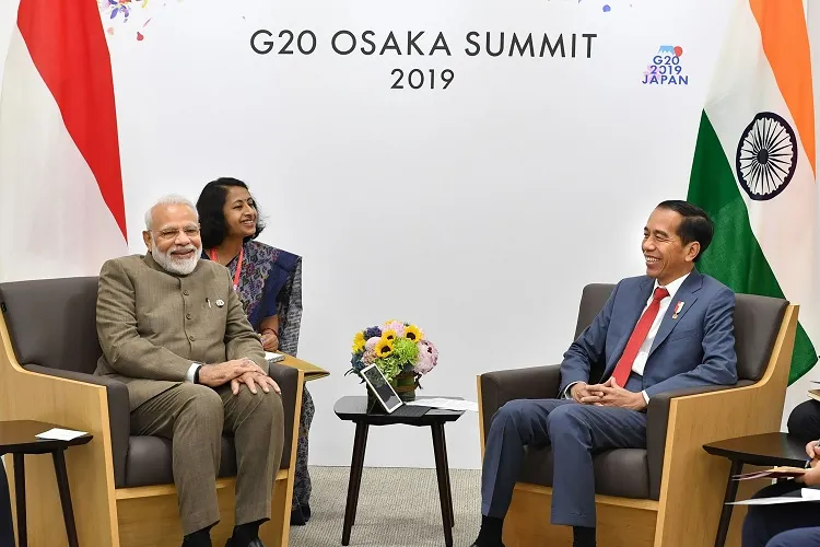 P M Narendra Modi meets the President of Indonesia Joko Widodo, on the sidelines of the G-20 Summit,- India TV Paisa