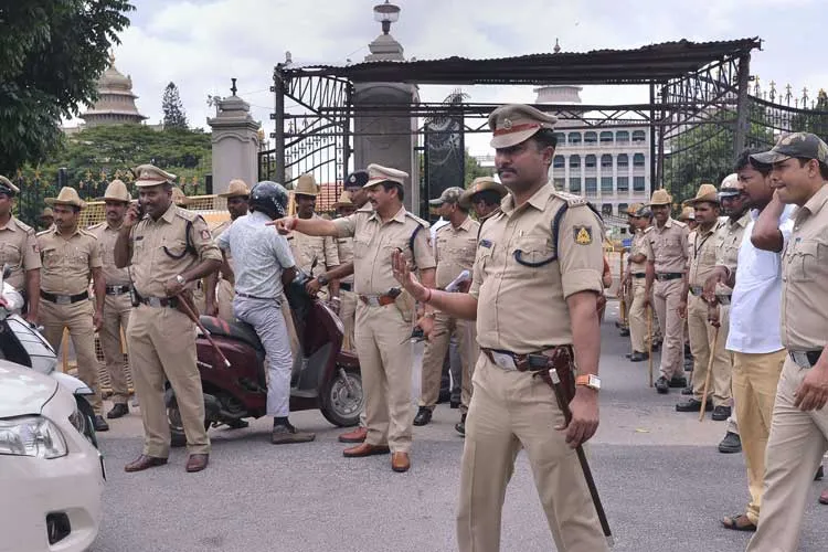 Police personnel stand guard at the entrance of the Vidhana...- India TV Hindi