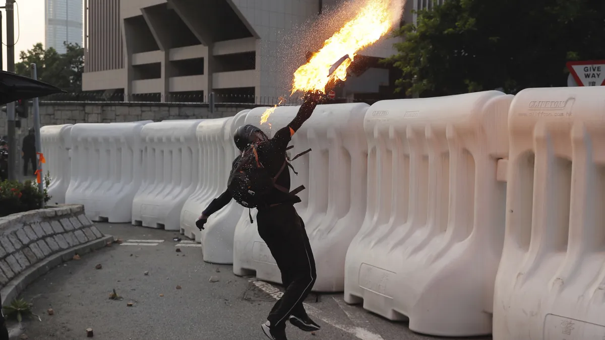 Hong Kong protesters hurl petrol bombs at government buildings | AP- India TV Hindi