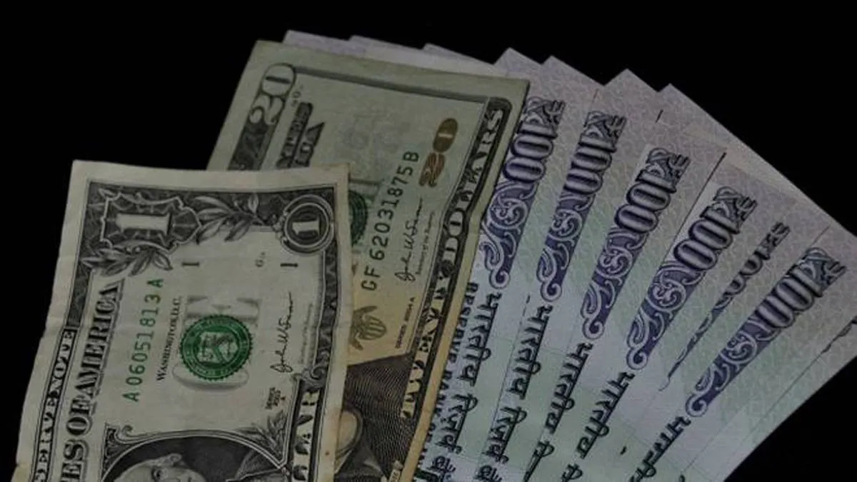 Rupee reverses gains to close nearly flat at 71.71 against US dollar- India TV Paisa